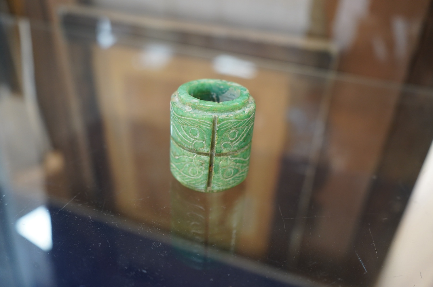 A group of Chinese carved jade and hardstone carvings in archaistic style. Condition - varies